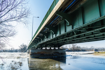bridge over a snow covered river