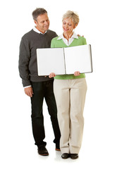 Couple: Holding an Open Scrapbook