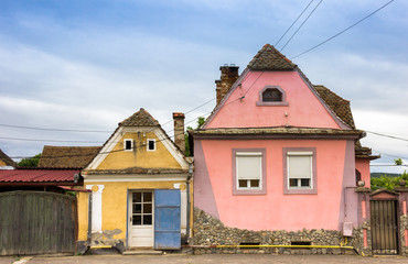 Fototapeta na wymiar Typical small and colorful transylvanian houses, Romania