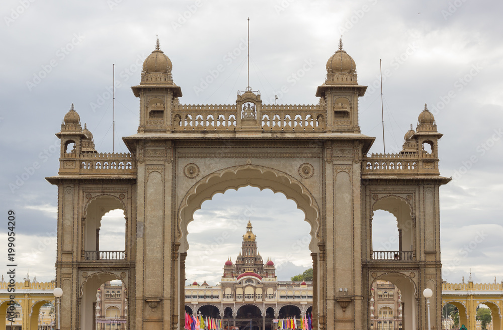 Wall mural mysore palace entrance on cloudy day. traditional indian architecture in karnataka state, india. tou