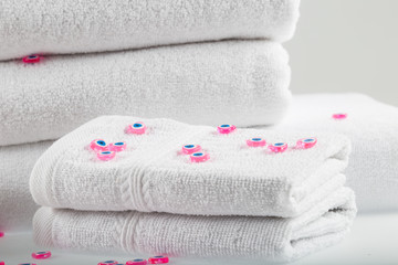 Towel concept. Spa concept. Photo for hotels and massage parlors. Purity and softness. Towel textile. 