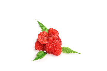 Fresh raspberry with green raspberry leaves isolated on white background