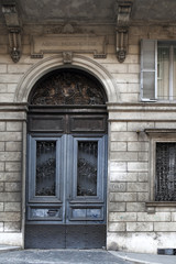 Antique classic old wood gate at Rome, Italy.