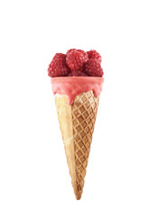 Glazed ice cream cones with raspberries isolated on a white background