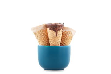 Glazed ice cream cones in a cup isolated on a white background
