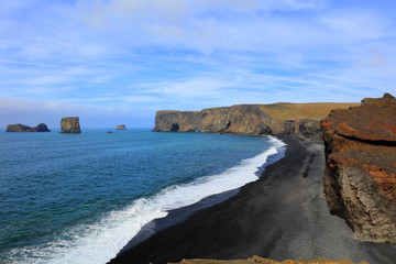 Beautiful black lava beach in Dyrholaey Iceland