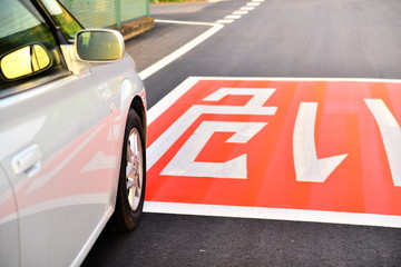 Dangerous sign white paint on street