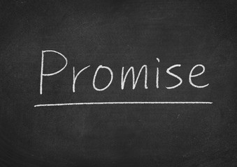 Obraz premium promise concept word on a blackboard background