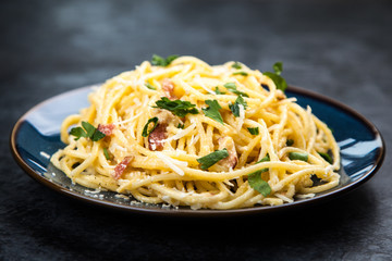 Spaghetti carbonara with egg and pancetta