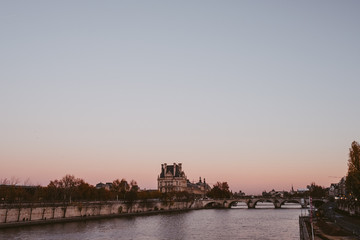 The Seine in Paris with a pink sunset