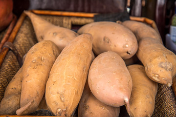 sweet potatoes and yams in basket 