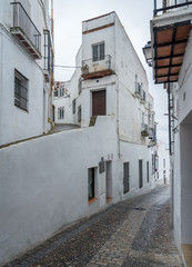 Narrow street in Arcos de la Frontera near Cadiz Spain