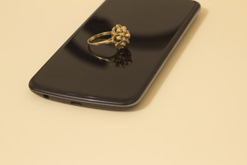 gold ring on the phone