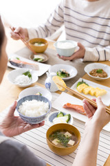 A couple eating breakfast in Japan