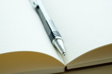 Top view of businessman  blank notebook business document black pen