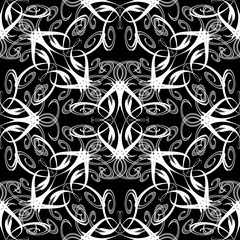 Fototapeta na wymiar Vintage swirls seamless pattern. Vector floral black and white background. Hand drawn abstract flowers, curves, line art tracery swirl ornaments. Isolated texture. Luxury design for fabric, wallpapers