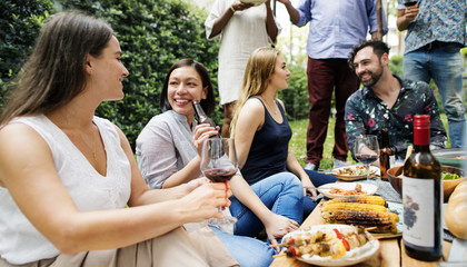Summer party of friends in the garden