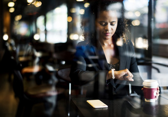 Woman waiting at a cafe