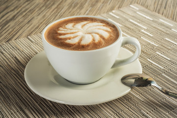 Obraz premium delicious cup of coffee finely decorated