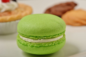 Delicious macaron on white  plate