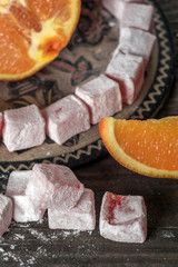 Turkish Delight, eastern delicacy with orange slices