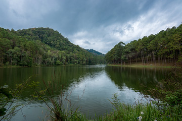 Naklejka na ściany i meble River dam for camping in the forest in the national park, Traveling in Thailand