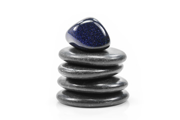 Healthy stones placed on white floor.