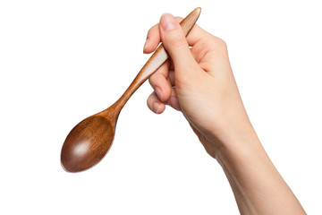 brown wood spoon in hand isolated on white background