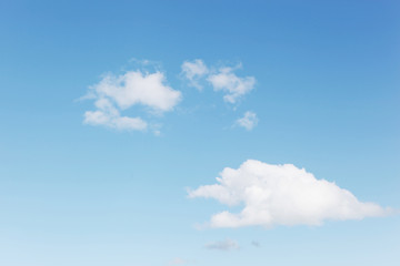 Blue sky filled with fluffy white clouds