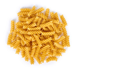 pile of spiral pasta isolated on white background. copy space, template