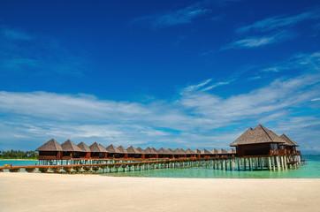 Exotic wooden huts on the water, Maldives - 199085613