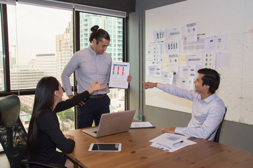 Business Concepts. Businessman is working in office. Business People work happily and relax. The businessmen are serious. Businessmen, they talk and communicate.