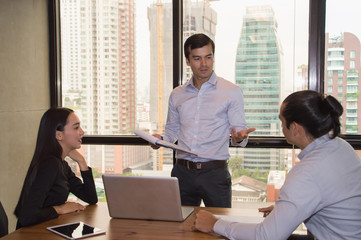 Business Concepts. Businessman is working in office. Business People work happily and relax. The businessmen are serious. Businessmen, they talk and communicate.