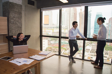 Business Concepts. Businessman is working in office. Business People work happily and relax. The businessmen are serious. Businessmen, they talk and communicate.