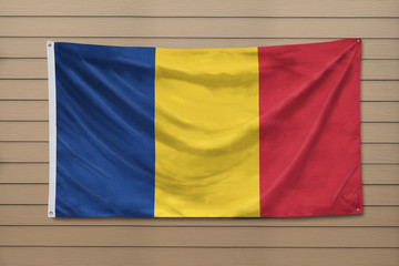 Romania Flag hanging on a wall