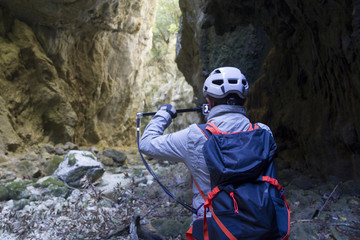 hiker in narrow gorge canyon at matese park gola del torano
