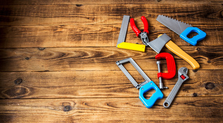 children tools on wooden background