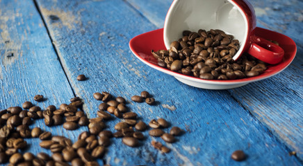 Coffee beans in coffee cup