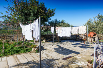 White clothes on clothesline, Greece