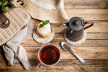 Composition with tea on a wooden background