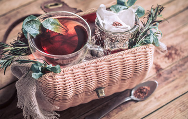 Composition with tea on a wooden background