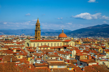 View across the rooftops of Florence Italy with Tuscan hills in the background