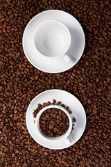 white cup of coffee at coffee beans backgrounds