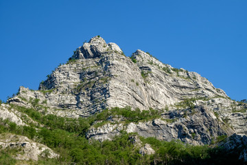 Fototapeta na wymiar high craggy mountain top and blue sky in Bosnia and Herzegovina