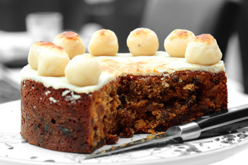 Simnel cake,  traditional at Easter,  on a cake stand with selective color