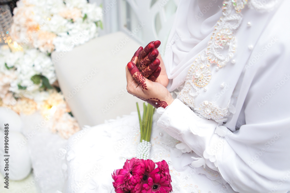 Wall mural A traditional malaysian wedding bride hand henna art. Selective focus.