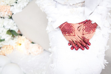 A traditional malaysian wedding bride hand henna art. Selective focus.