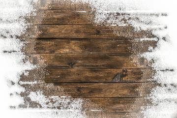 Thaw on the wooden floor terrace in the backyard.