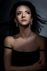 Lady in studio shoot, fashion model in black dress, elegant woman beauty portrait