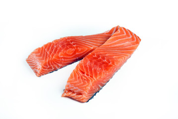 Slices of the fresh salmon on white